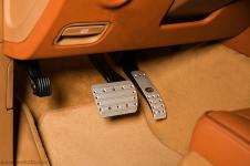 Porsche Cayenne перетяжка панели кожей